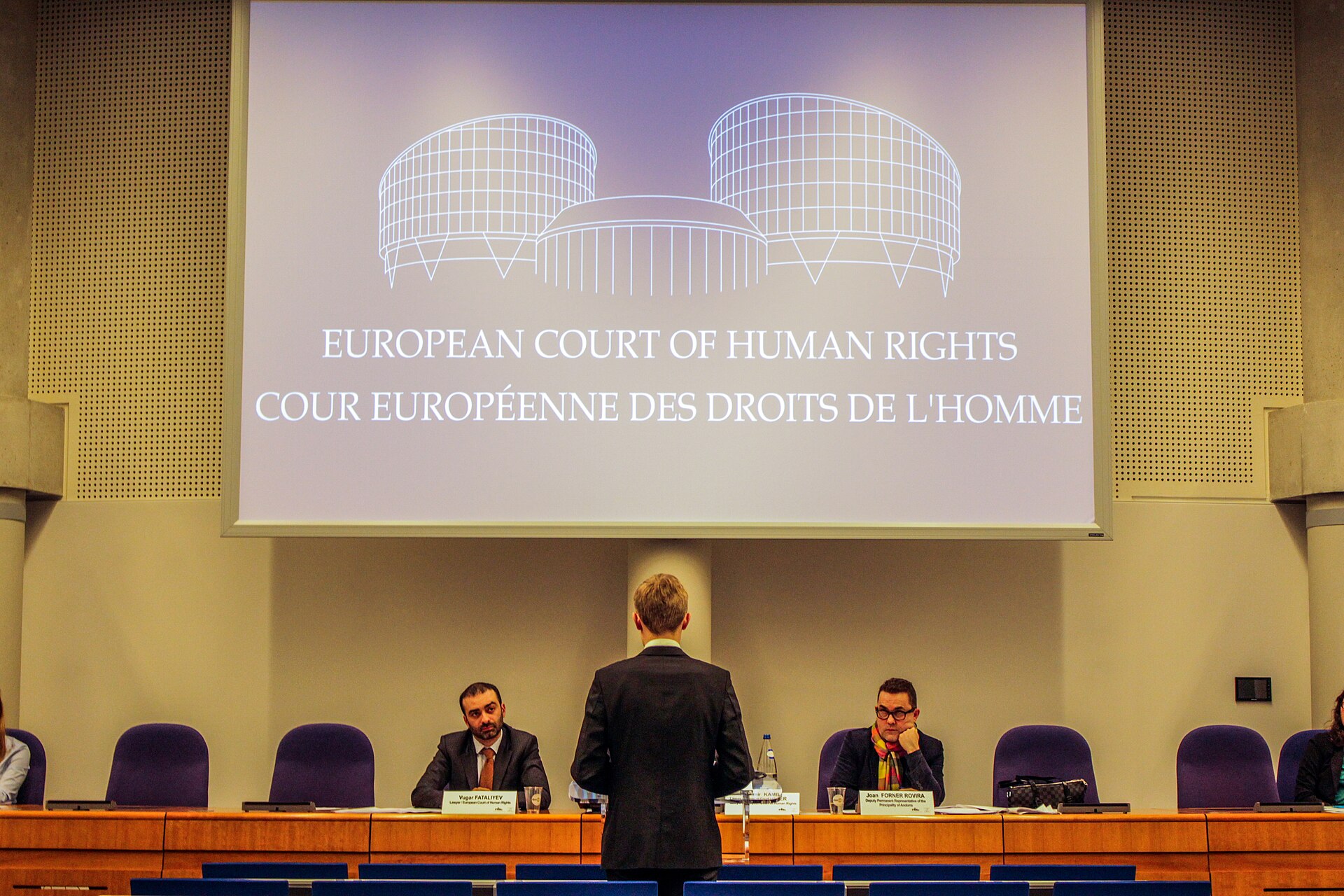 A participant in an international student moot court addresses judges at the European Court of Human Rights