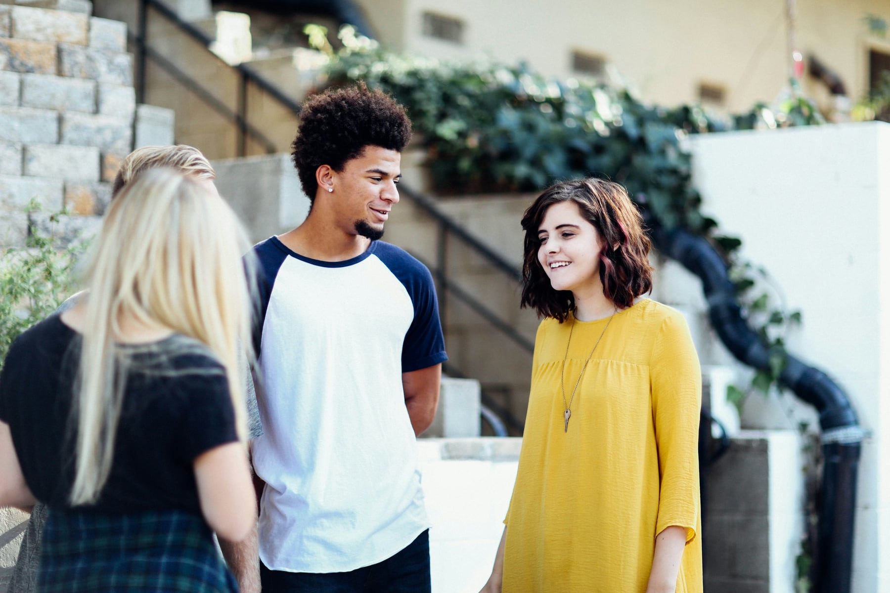 An international group of students talking on a university campus